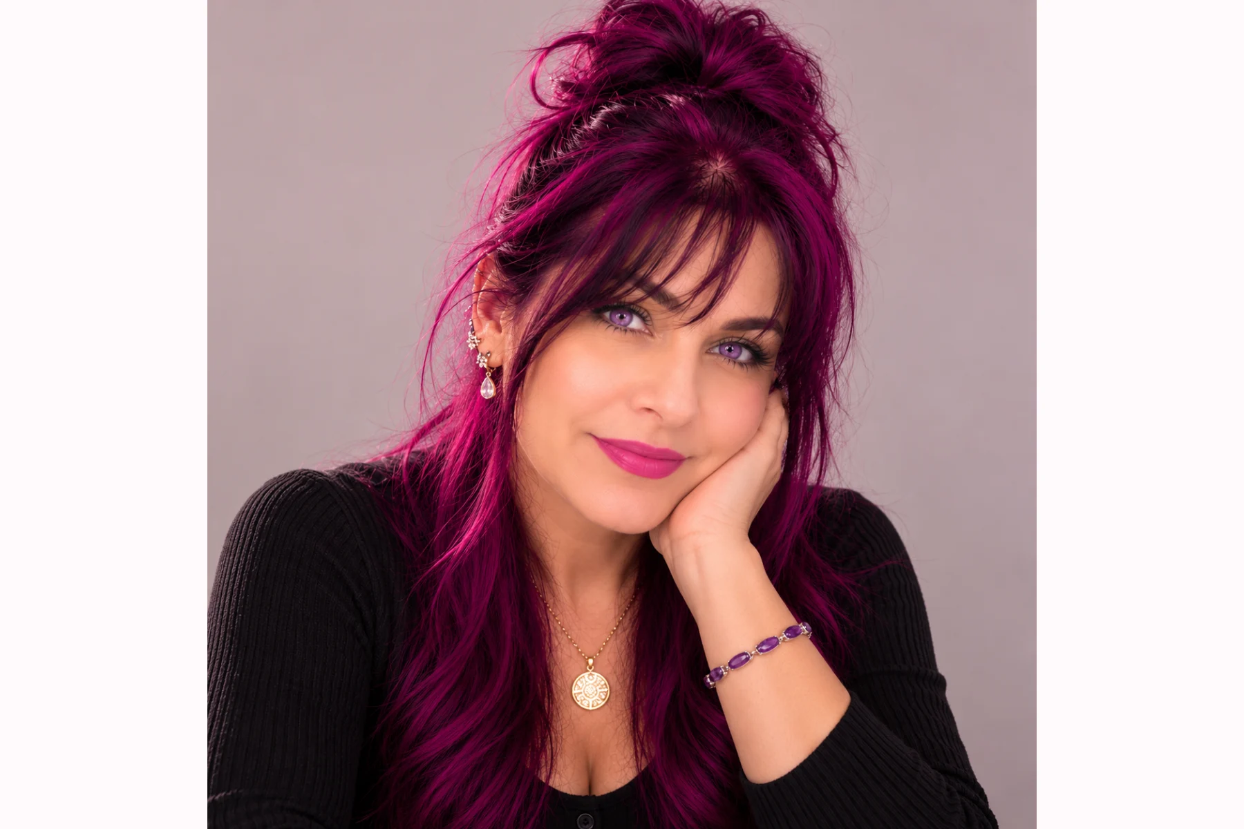 Dr. Elena wearing vivid magenta-purple Lunar Tides hair color.